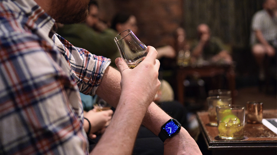 Man drinking a drink at Antique Bar - Elsternwick