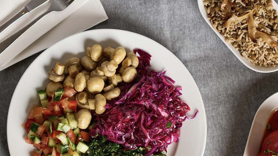 Overhead photo of colourful middle eastern dishes